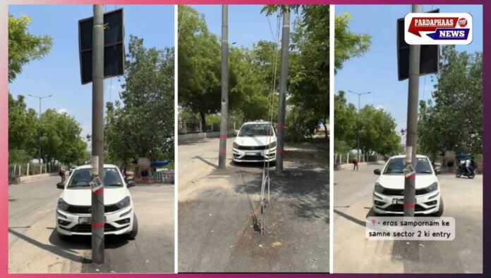 इरोस संपूर्णम के सामने सेक्टर-2 एंट्री पर सड़क के बीच खंभों से बढ़ा हादसे का खतरा, त्वरित कार्रवाई की मांग